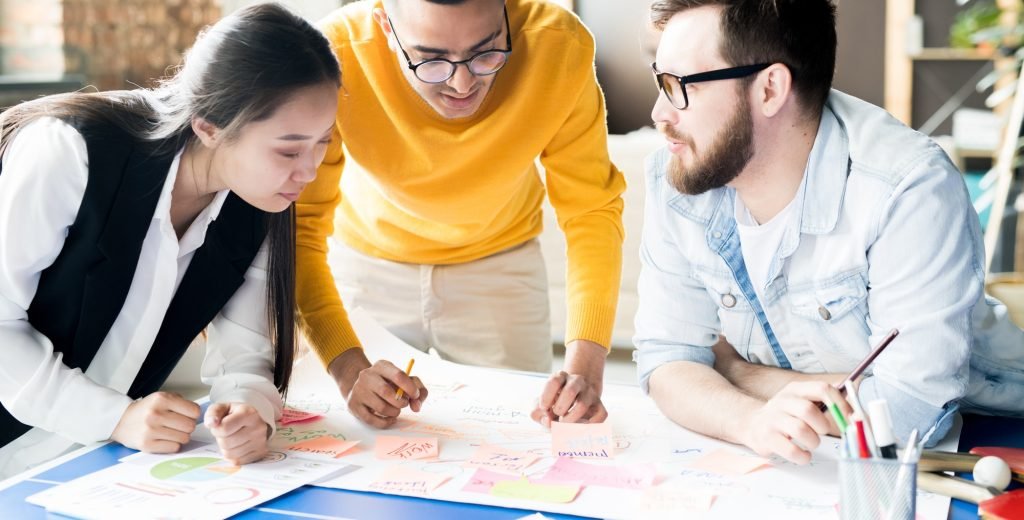 Contemporary Business Team Discussing Projects